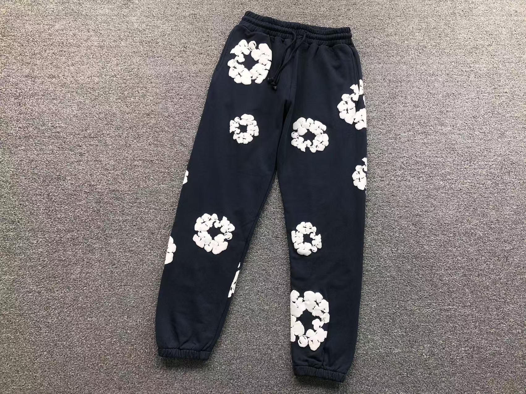 7f3e4e1a DENIM TEARS TROUSER - Image 1