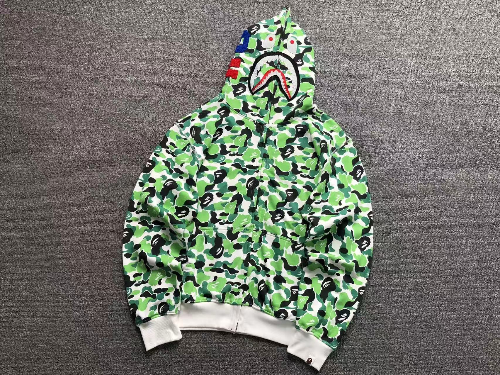 0cb8785f A Bathing Ape green camouflage shark full-zip hoodie - Image 1